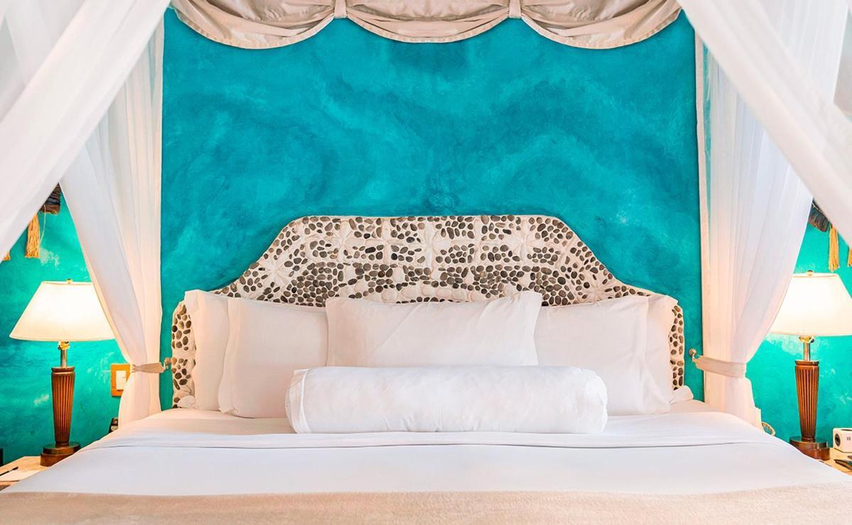 Dpny Beach Hotel & Spa إلهابيلا المظهر الخارجي الصورة A bed with a headboard