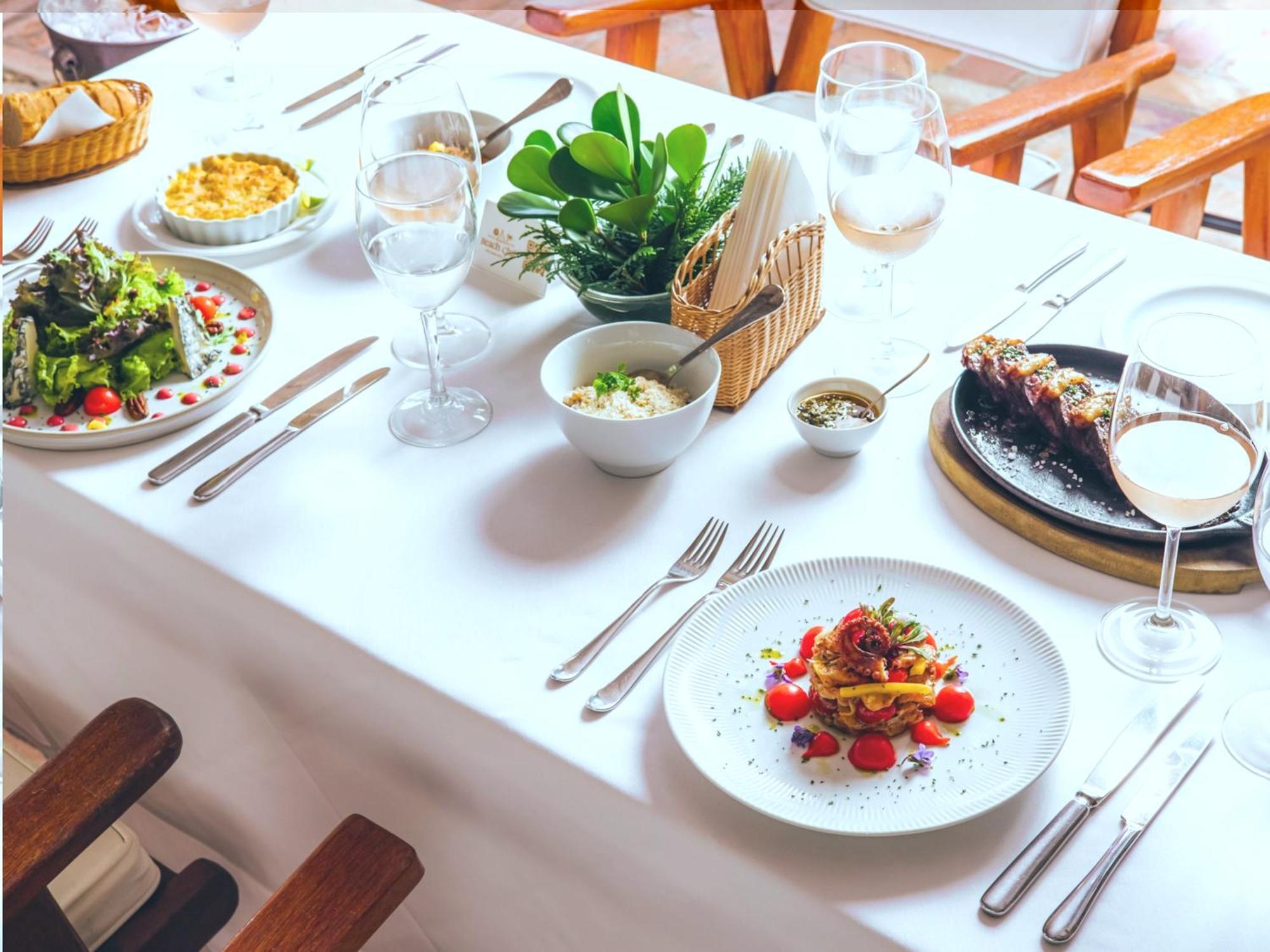 Dpny Beach Hotel & Spa إلهابيلا المظهر الخارجي الصورة A table set for fine dining